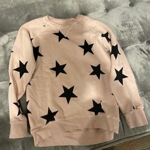 Nununu star sweatshirt in a size 8-9